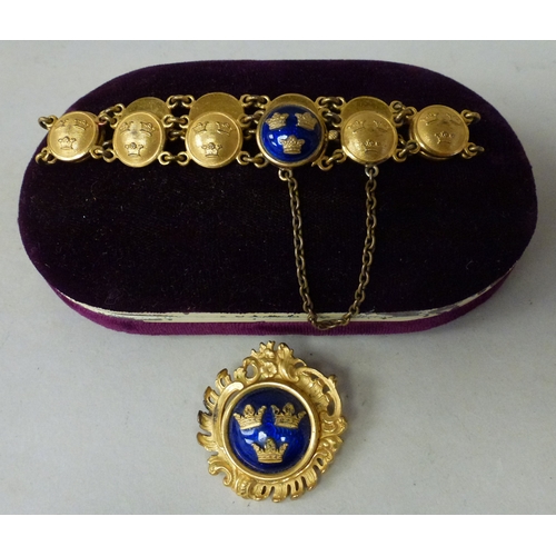 8 - A Sporrong & Co Swedish gilt metal and blue enamelled brooch; and matching bracelet