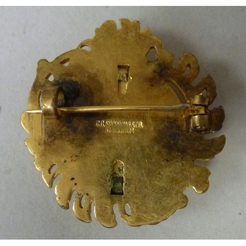 8 - A Sporrong & Co Swedish gilt metal and blue enamelled brooch; and matching bracelet