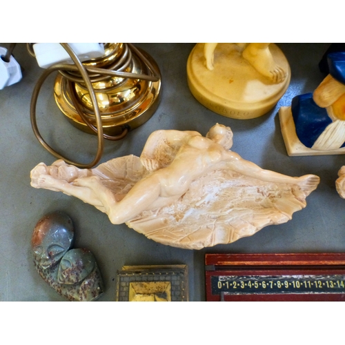 A mixed lot: to include a resin sculpture, a discus thrower 16