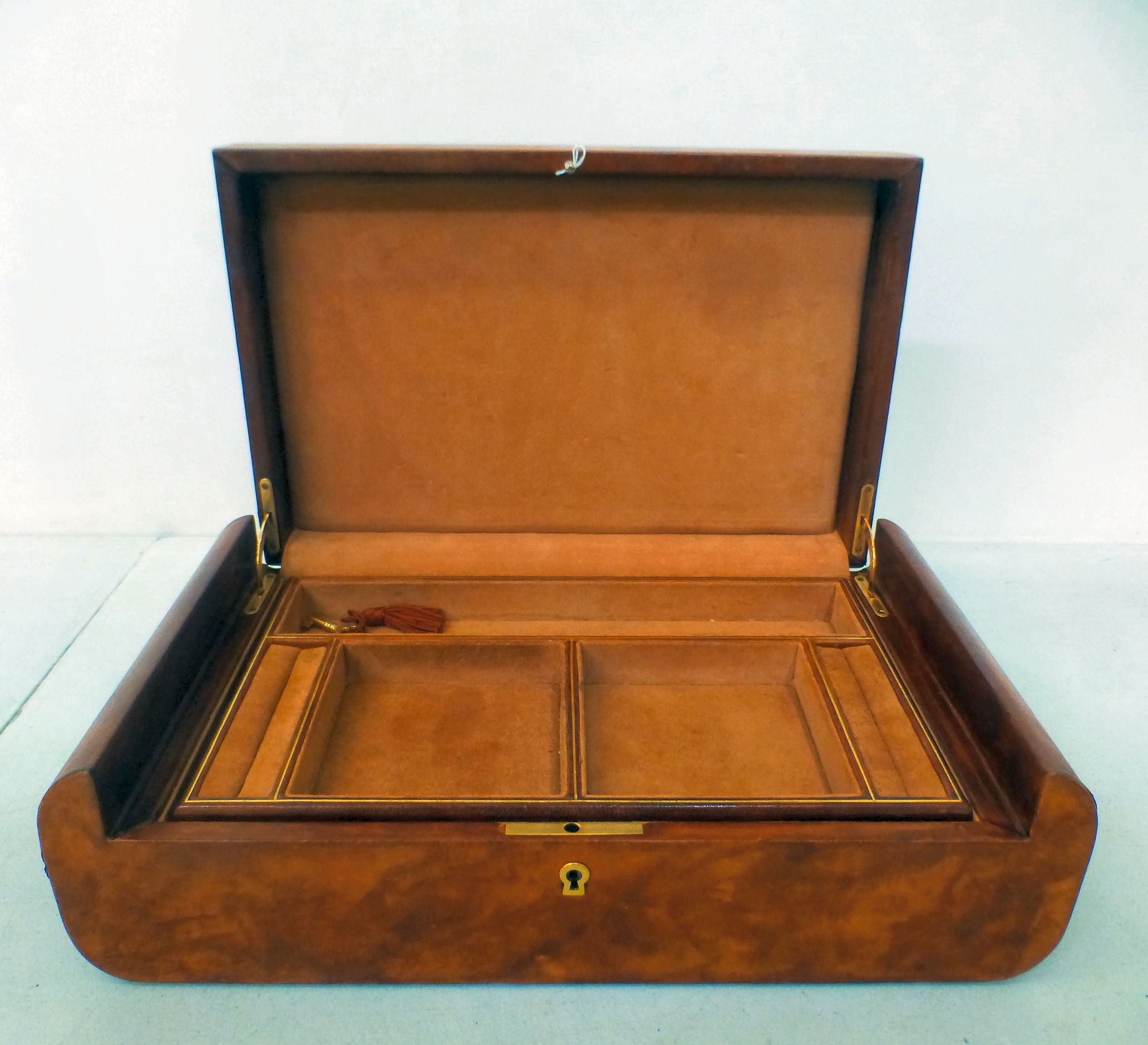 A modern Made in Italy mottled tan coloured hide jewellery box with a ...