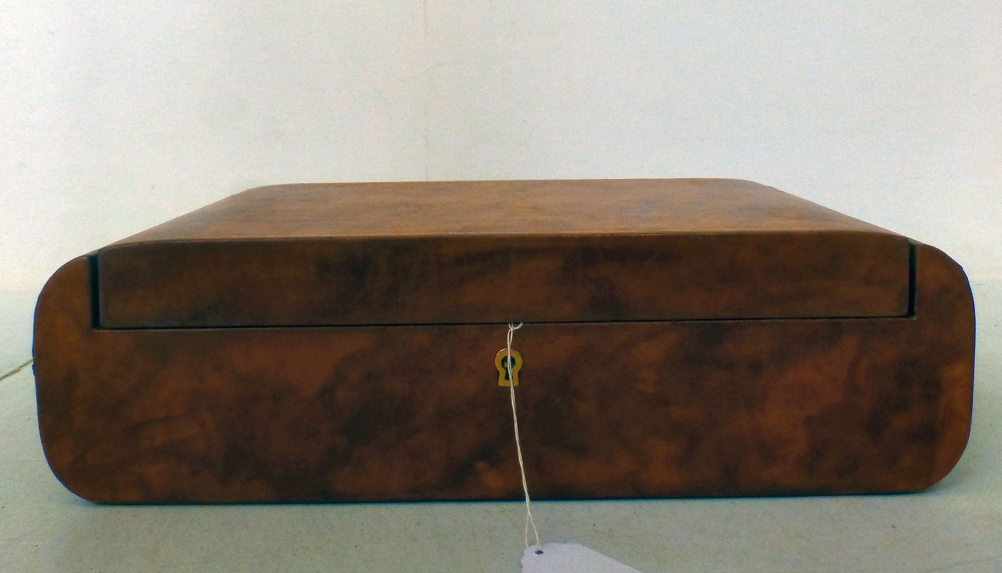 A modern Made in Italy mottled tan coloured hide jewellery box with a ...