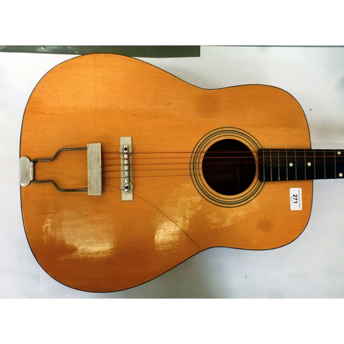 A six string acoustic guitar