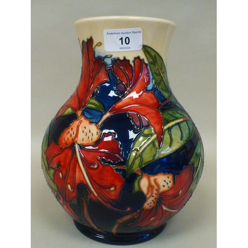 10 - A Moorcroft pottery Simeon pattern vase  bears printed marks  dated '99  9.5