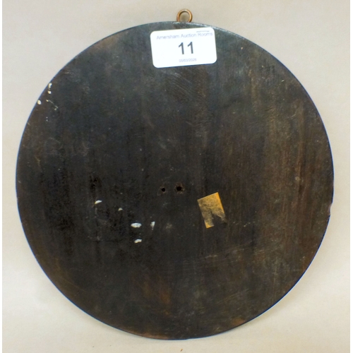 11 - An Arts & Crafts period worked and pressed brass plaque of a swan. amongst C-scroll and foliage,... 