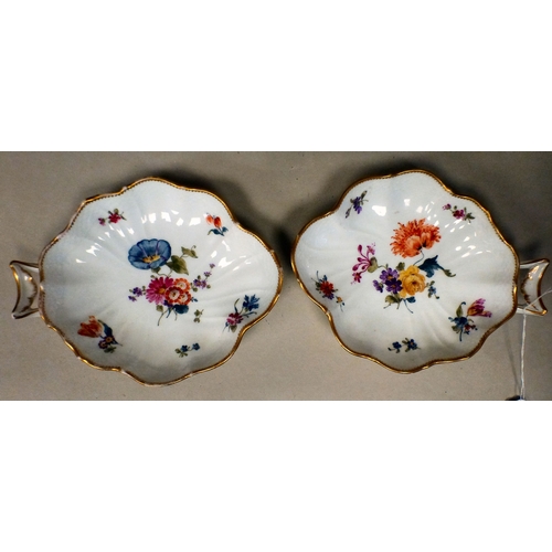 12 - A pair of late 18th/early 19thC Copenhagen porcelain leaf design, open handled shallow dishes with g... 