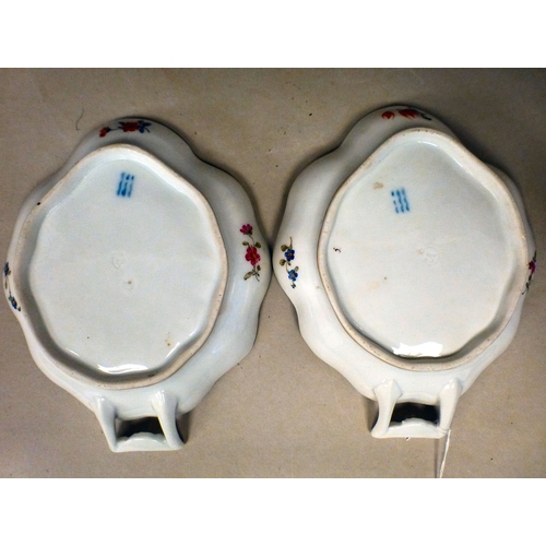 12 - A pair of late 18th/early 19thC Copenhagen porcelain leaf design, open handled shallow dishes with g... 