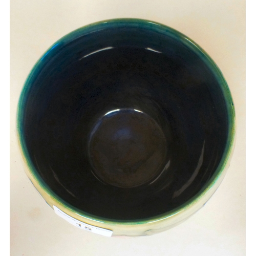 15 - A Moorcroft pottery Clematis pattern vase  bears printed marks   5.5