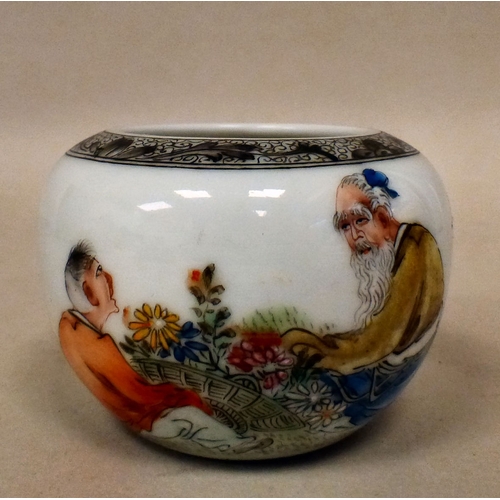 2 - A Chinese Republic era (1912-1949) porcelain bowl of squat, bulbous form, decorated with two elderly... 