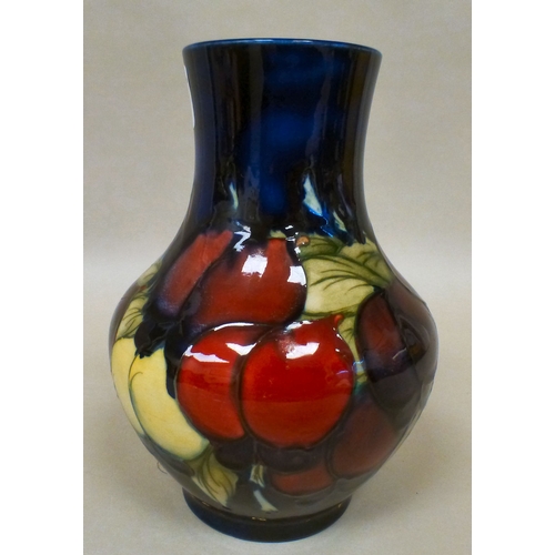 24 - A Moorcroft pottery Wisteria pattern vase  bears printed marks   7