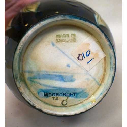 24 - A Moorcroft pottery Wisteria pattern vase  bears printed marks   7