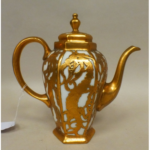 26 - A mid/late 19thC (possibly French) coffee pot, in milk coloured porcelain, decorated in relief with ... 