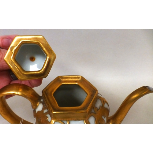 26 - A mid/late 19thC (possibly French) coffee pot, in milk coloured porcelain, decorated in relief with ... 