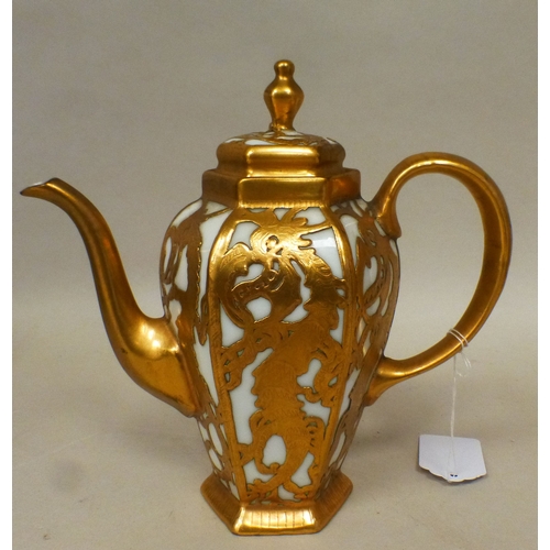 26 - A mid/late 19thC (possibly French) coffee pot, in milk coloured porcelain, decorated in relief with ... 