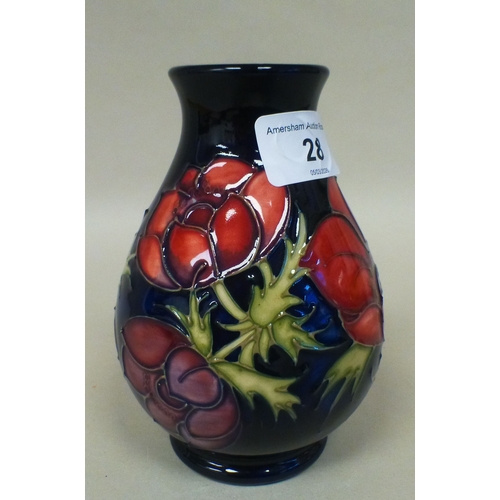 28 - A Moorcroft pottery Anemone pattern vase  bears printed marks  numbered 34/95  6