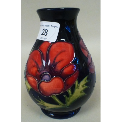 28 - A Moorcroft pottery Anemone pattern vase  bears printed marks  numbered 34/95  6