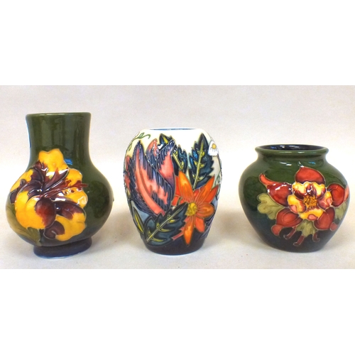 29 - Three Moorcroft pottery vases: to include a Castle Garden pattern vase  bears marks  4
