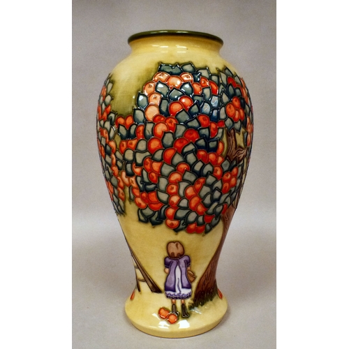 30 - A Moorcroft pottery Apple Tree pattern vase  bears printed marks  dated '97  10.5