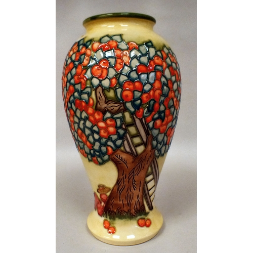 30 - A Moorcroft pottery Apple Tree pattern vase  bears printed marks  dated '97  10.5
