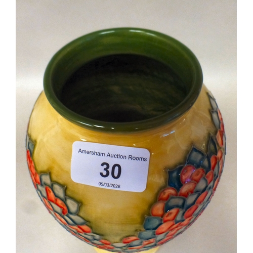 30 - A Moorcroft pottery Apple Tree pattern vase  bears printed marks  dated '97  10.5