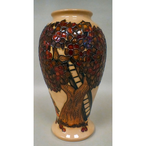 31 - A Moorcroft pottery Apple Tree pattern vase bears printed marks  dated '97  10.5