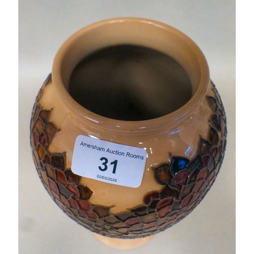 31 - A Moorcroft pottery Apple Tree pattern vase bears printed marks  dated '97  10.5