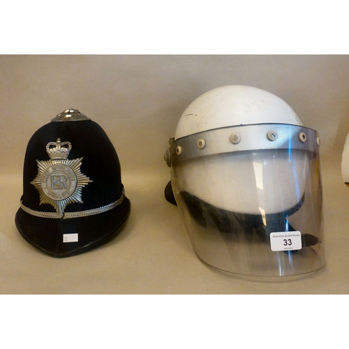 33 - Six Emergency services helmets: to include UK and American examples(Please Note: this lot is subject... 