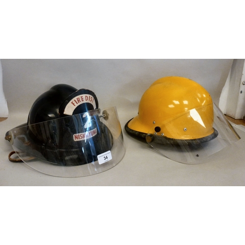 34 - Six Emergency services helmets: to include UK and American examples(Please Note: this lot is subject... 