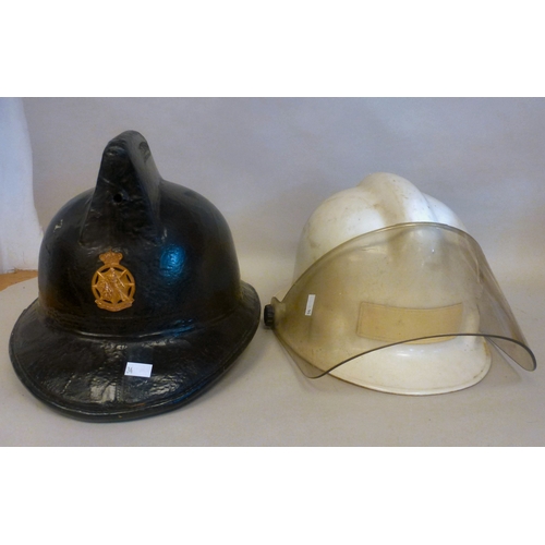 34 - Six Emergency services helmets: to include UK and American examples(Please Note: this lot is subject... 