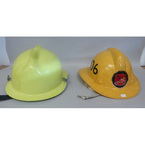 34 - Six Emergency services helmets: to include UK and American examples(Please Note: this lot is subject... 