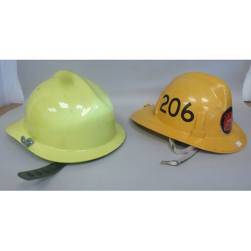 34 - Six Emergency services helmets: to include UK and American examples(Please Note: this lot is subject... 