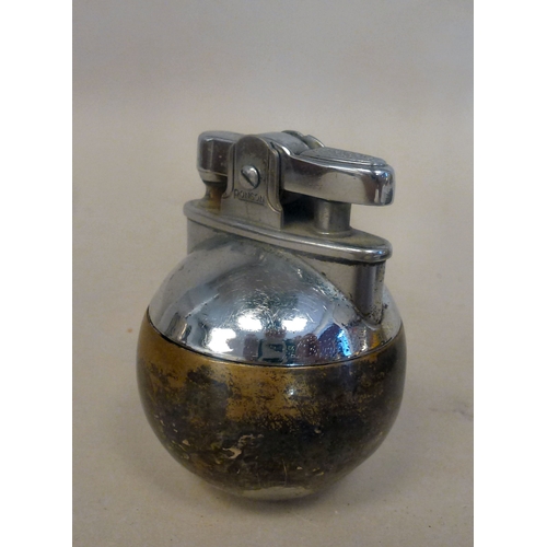 36 - An Art Deco Ronson cast metal Rondelight ballerina table lighter&nbsp; 7