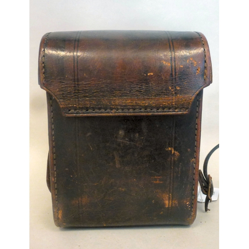 39 - A Rolleiflex camera, in a stitched hide case