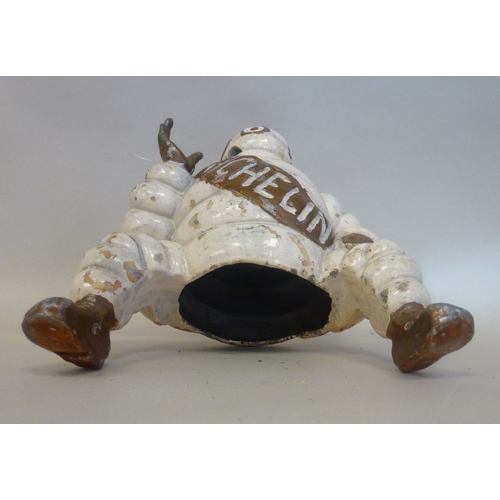 41 - A Michelin Man cast metal compressor ornament&nbsp; 8