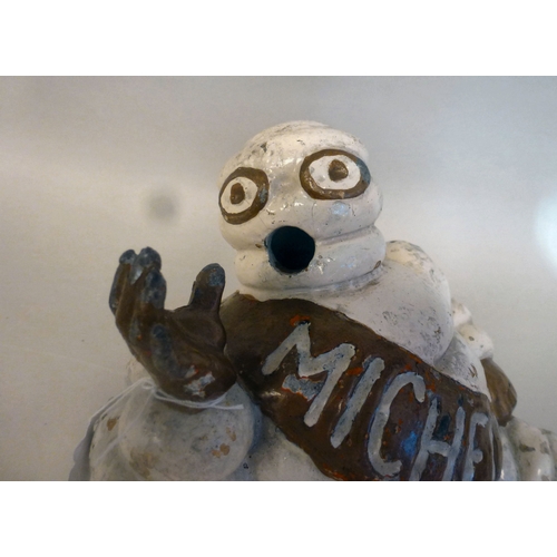 41 - A Michelin Man cast metal compressor ornament&nbsp; 8