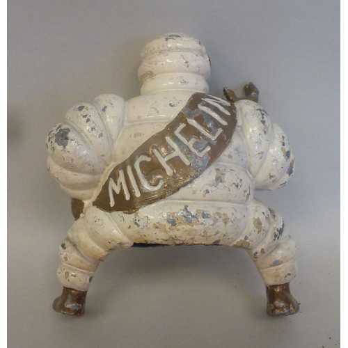 41 - A Michelin Man cast metal compressor ornament&nbsp; 8