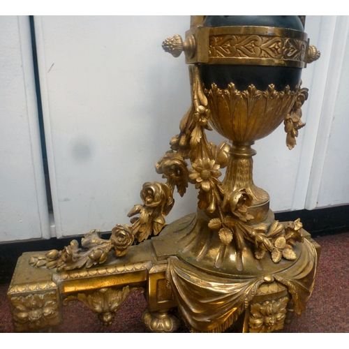 48 - A pair of late 19thC French cast brass andirons  19