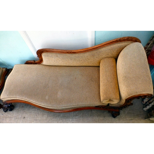 5 - A pair of mid Victorian mahogany showwood framed chaise longue, upholstered in oatmeal coloured fabr... 