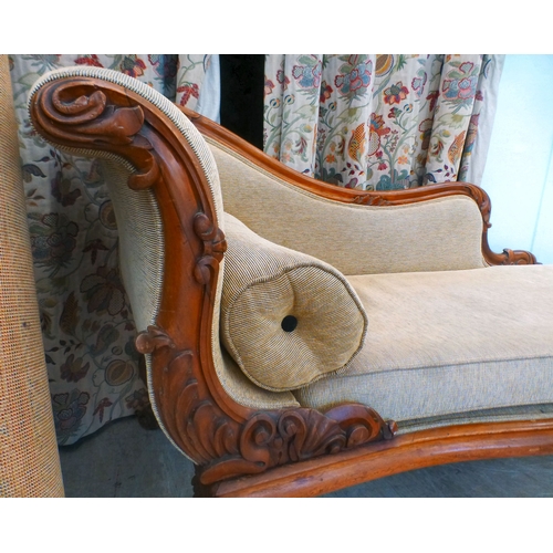 5 - A pair of mid Victorian mahogany showwood framed chaise longue, upholstered in oatmeal coloured fabr... 