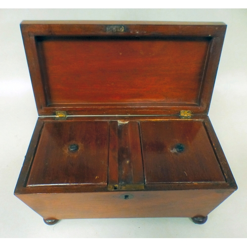 6 - A late Regency mahogany tea caddy of sarcophagus form, the hinged lid enclosing two lidded compartme... 
