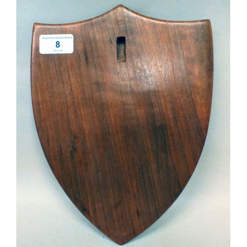 8 - A mid 20thC shield shaped fruitwood plaque, inscribed 'World War II Escape Lines Memorial Society' a... 