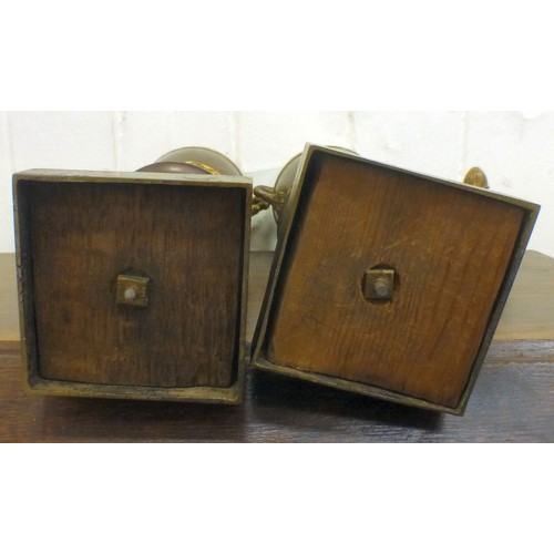 37 - A pair of late 19thC Empire design cast metal, urn design vases/candlesticks, on a plinth  14.5