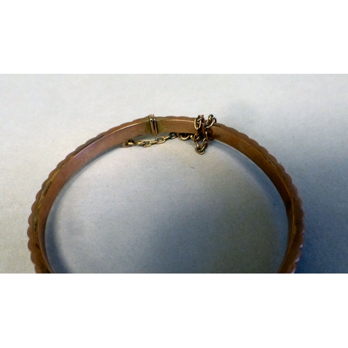 12 - A 9ct gold Christening bangle&nbsp; (approx. 3.9grms)