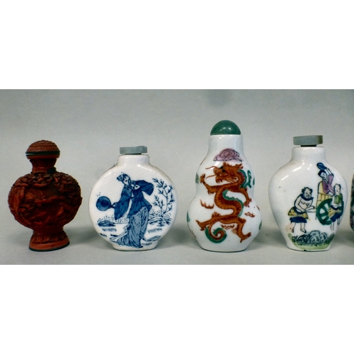 20 - Eight Chinese porcelain and cinnabar scent bottles with various decoration
