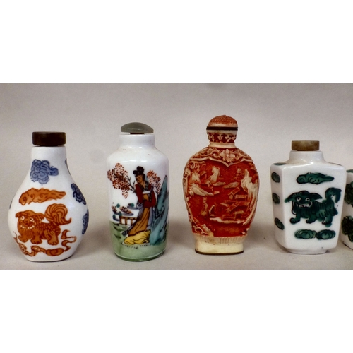 24 - Eight Chinese porcelain and resin scent bottles with various decoration