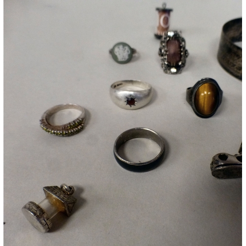 26 - Silver and white metal items of personal ornament: to include a charm bracelet; and two bangles