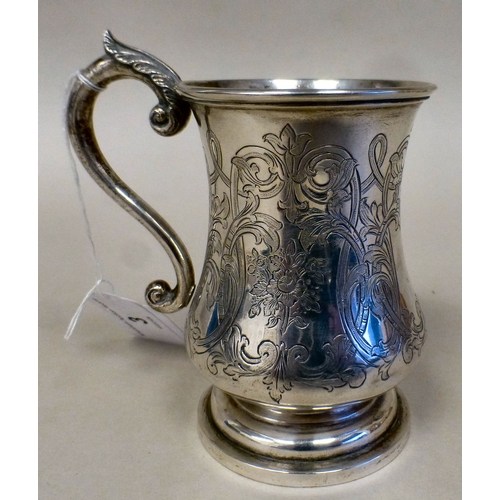3 - An Indian Orr & Sons silver Christening tankard with swag engraved ornament  Stamped ORR  4.5