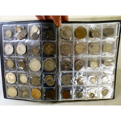35 - An uncollated album of British pre-decimal, American and other coins: to include Commonwealth issues