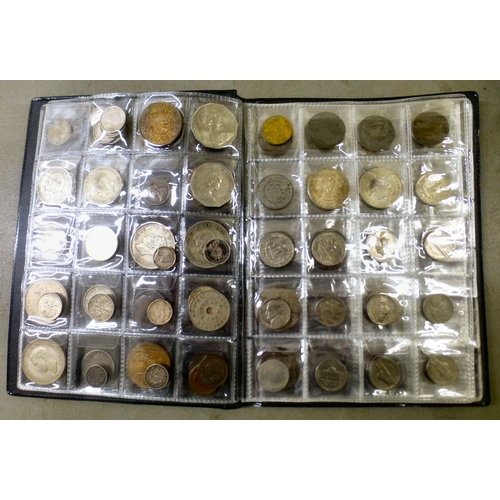 35 - An uncollated album of British pre-decimal, American and other coins: to include Commonwealth issues