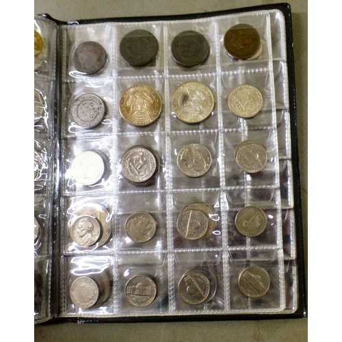 35 - An uncollated album of British pre-decimal, American and other coins: to include Commonwealth issues