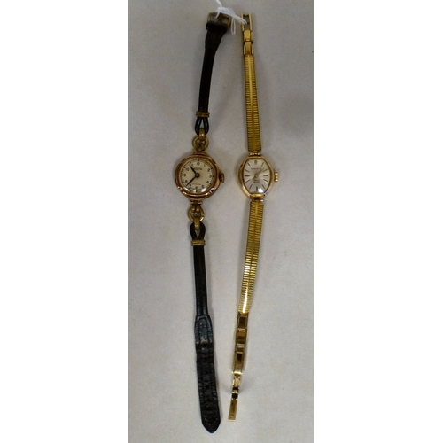 40 - Two ladies 9ct gold cased wristwatches, one on a metal strap, the other leather&nbsp;